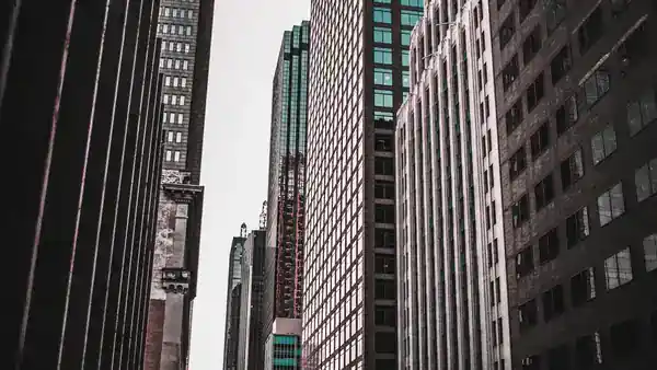 Office buildings viewed from street level.
